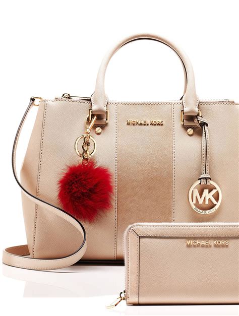 michael kors taschen beliebtheitsgrad|Michael Kors opened satchel purse.